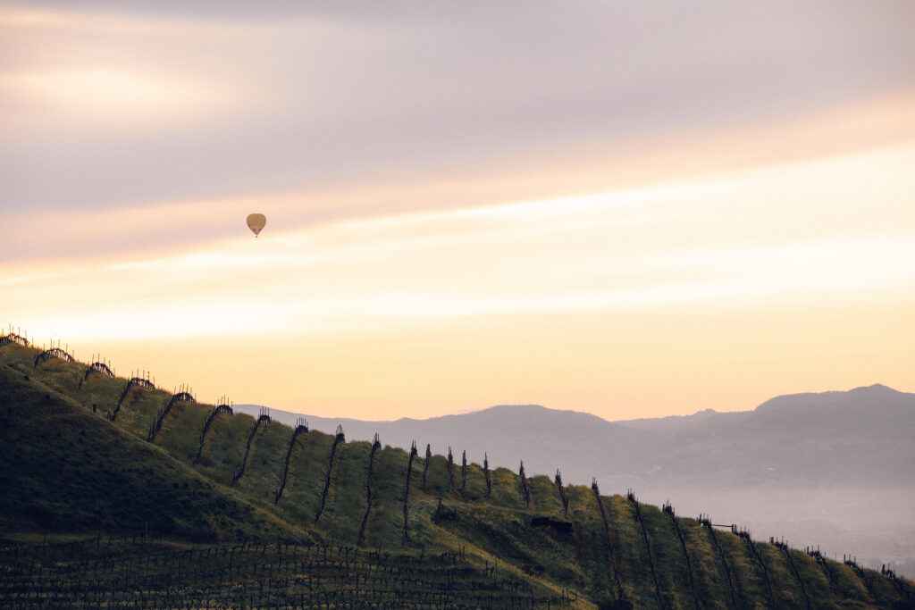 Balloon rises over the slope of Veeder Ridge