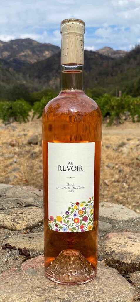Au Revoir Rosé Bottle on Wildflowers